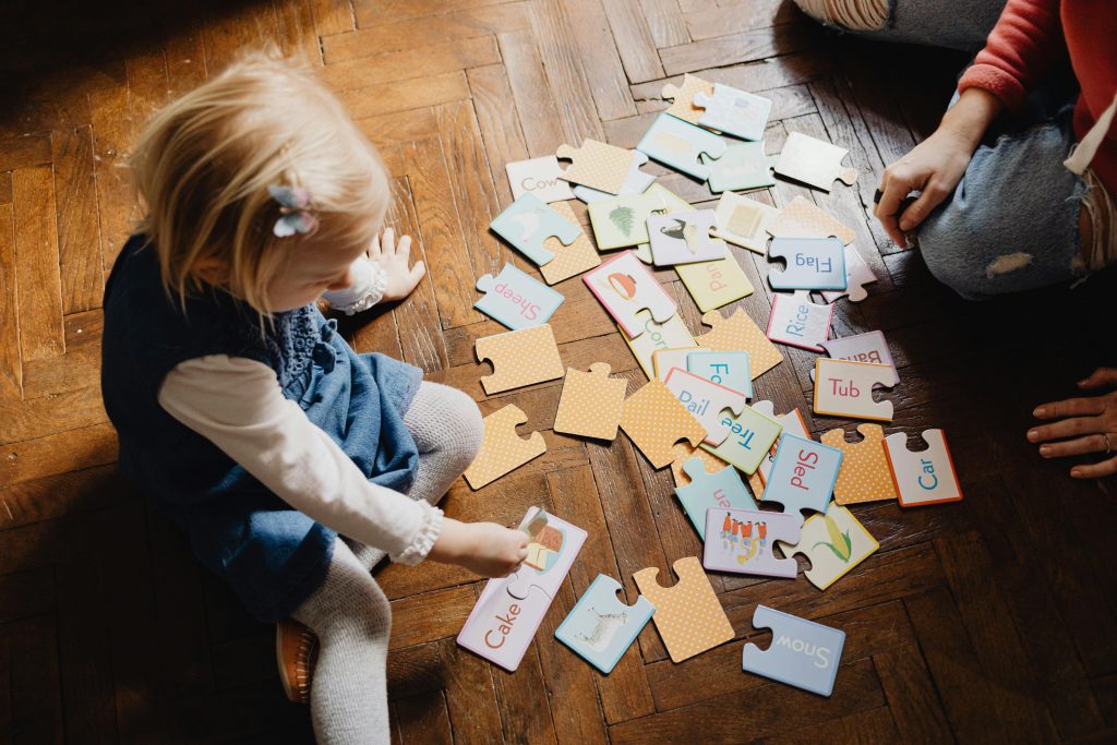 kids playing puzzles